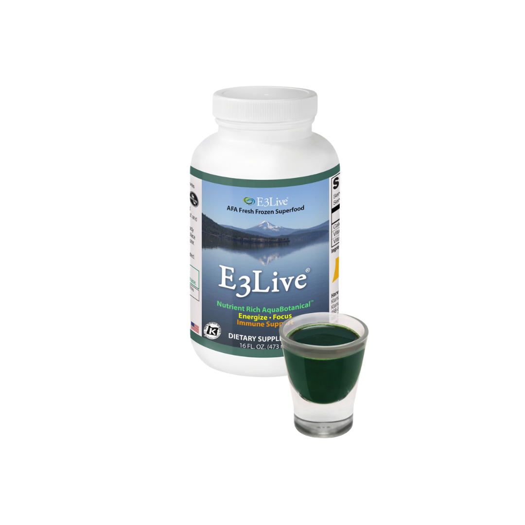 E3Live Original 16oz bottle beside a shot glass of the green liquid 
