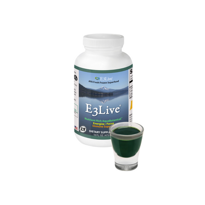 E3Live Original 16oz bottle beside a shot glass of the green liquid 